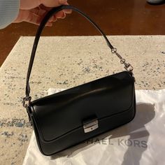 Michael Kors Small Bradshaw Black Leather Original Price: $298 Used Once! Excellent Condition :) Comes With Original Dust Bag! Approx. 10.75" W X 5.88" H X 2.75" D Bag; 7" Handle Drop; 18" , 20" , 22" Strap Drop Approx. Weight 1.54 Lbs. Micheal Kors Handbag, Tiny Purse, Mini Crossbody Purse, Bags Michael Kors, Michael Kors Crossbody Bag, Michael Kors Crossbody, Mini Shoulder Bag, Mini Purse, Purses Michael Kors