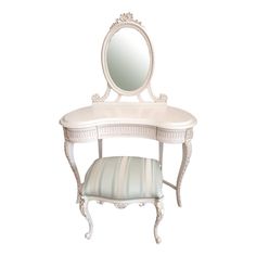 a white vanity with a mirror and striped cushion on the top shelf next to it