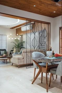 the dining room table is surrounded by chairs and tables with glass doors on each side