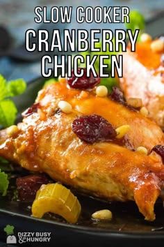 slow cooker cranberry chicken on a black plate