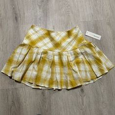 Size S Never Worn; New With Tags ** Top Rated Seller ** Same Day Shipping Or Next Day ** All Reasonable Offers Welcomed ** 10% Discounts Bundles ** New Listings Daily! Preppy Plaid Tennis Skirt For Summer, Plaid Mini Tennis Skirt For Summer, Summer Plaid Mini Tennis Skirt, Fitted Plaid Tennis Skirt For Spring, Summer School Plaid Skirt, Plaid Tennis Skirt For School Summer Season, Yellow Mini Skirt For School, Retro Pleated Skirt For School In Spring, Casual Plaid Pleated Skirt For Summer