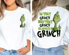 a woman wearing a white shirt with the words grinch on it