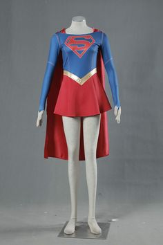 a woman's superman costume is displayed on a mannequins head and torso