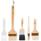 an assortment of paintbrushes and brushes on a white background