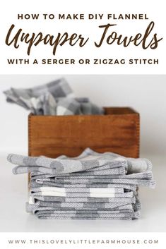 several folded towels stacked on top of each other with text overlay that reads how to make diy flannel wrapper towels with a secret or zigzag stitch