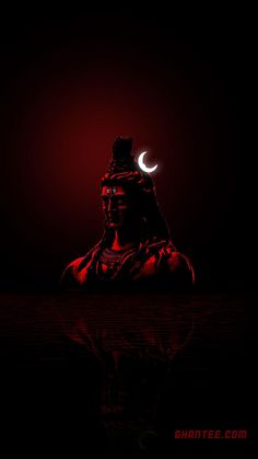 the silhouette of a person with a crescent on their head in the dark, against a red and black background