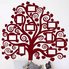 a wall decal with hearts and frames on it in the shape of a tree