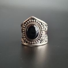 Solid sterling silver ring Stamped and tested Black onyx gemstone UK ring size T1/2 USA ring size 10 ENJOY FREE TRACKED SHIPPING WITHIN THE UK ENJOY FREE INTERNATIONAL TRACKED SHIPPING  I meticulously test all my solid sterling silver jewellery for authenticity, ensuring quality regardless of the presence of the 925 stamp.  While the test mark is typically found inside the shank, it may be  polished off on earrings and pendants if it becomes too noticeable. Any other silver or alloys used will be mentioned in the description  My photos also serve as descriptions, so please carefully examine them. I make every effort to provide accurate descriptions and sizing for all items i sell. Do keep in mind that these items are vintage, not brand new. Vintage items may have imperfections, as is commo Unique Black Crystal Ring In Sterling Silver, Gothic Onyx Ring With Gemstone, Gothic Onyx Gemstone Ring, Gothic Black Ring Stamped 925, Nickel-free Black Open Ring Jewelry, Nickel-free Black Open Ring, Black Bohemian Rings With Gemstone, Black Bohemian Gemstone Rings, Bohemian Black Gemstone Rings