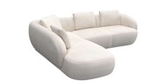 a white couch with pillows sitting on it's back end and armrests