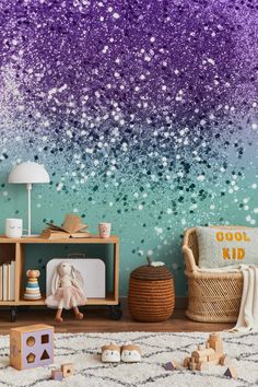 a child's room with pink, purple and blue glitter wallpaper on the walls