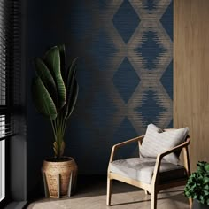 a chair and potted plant in front of a wall with geometric designs on it