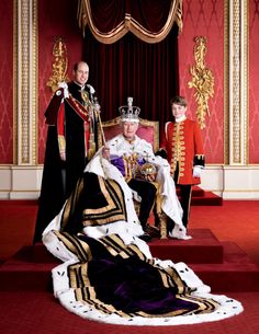 the royal family posing for a photo in their official regal robes