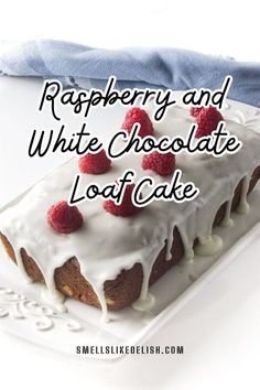 raspberry and white chocolate loaf cake on a plate with the words raspberry and white chocolate loaf cake