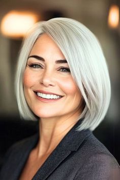 Save this pin for the best short haircuts for fine hair. The deep side part of this silver bob adds an instant lift and creates a gorgeous asymmetrical look. Soft layers throughout give movement and body to even the finest strands. Short Gray Hairstyles, Gray Hairstyles, Grey Hair Over 50, Layered Haircuts For Women, Layered Bob Haircuts, Classic Bob, Choppy Bob Hairstyles, Gray Hair Cuts, Short Grey Hair