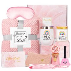 the pink gift set includes an eye mask, body scrubs and other items