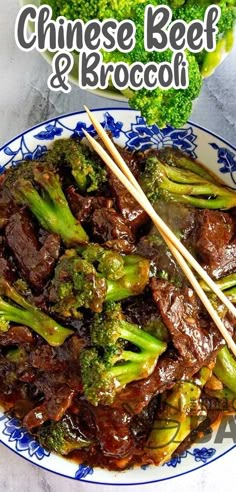 beef and broccoli stir fry on a plate with chopsticks in it