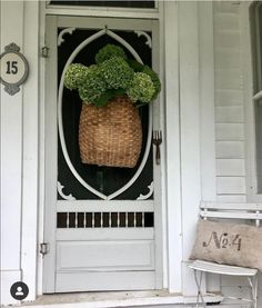 a door with a basket full of vegetables on it