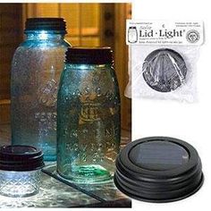 three mason jars with lids are sitting on a table next to each other and one has a coin in it