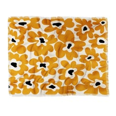 an orange and white scarf with black spots