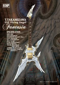 an electric guitar with white wings on it's neck and the words, takamiza