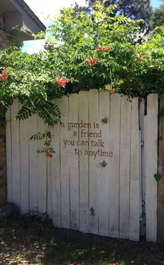 a garden is a friend you're talking to the real time written on a fence