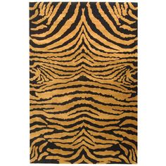 an animal print rug with black and gold stripes