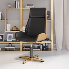 a black office chair sitting in front of a book shelf