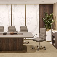 a conference table with chairs and a bowl on it in front of a white wall