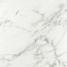 a white marble textured background with black and grey details on the top right corner