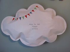 this is our happy place paper plate with bunting and flags on the edge that says it's ok to get happy place