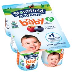 three boxes of stonyfield organic baby yogurt with blueberries and apples on them