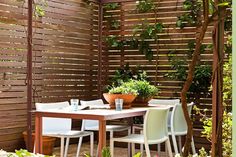 How to make a garden privacy screen | Better Homes and Gardens Rock Retaining Wall, Cool Fire Pits, Garden Screening, Homes And Gardens, Cabin Homes