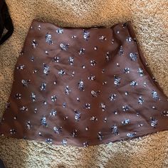 This Is A Small Mini Skirt Perfect For Summer!! Never Worn!!!! Brown Lined Mini Skort, Casual Brown Mini Skirt For Day Out, Trendy Brown Skirted Bottoms, Casual Brown Mini Skort, Casual Brown Mini Length Skort, Spring Mini Skirt In Brown, Brown Mini Skirt For Spring, Brown Skirt For Spring, Brown Spring Skirt