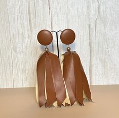 brown faux leather fabric earrings. Trendy Brown Earrings, Chic Brown Drop Earrings, Elegant Brown Leather Earrings, Chic Brown Earrings For Party, Trendy Brown Earrings For Party, Trendy Brown Party Earrings, Fabric Earrings, Faux Leather Fabric, Rochester Ny