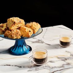 cookies and coffee on a marble table