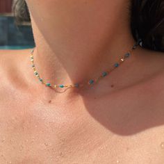 These precious chokers are the perfect layering summertime pop of color! Add them to your existing stack, or they're totally rad by themselves Wear them as a proper choker, or wrap it around your wrist to rock as a bracelet! Every choker is 14" with an attached 2" extender for adjustability up to 16" Don't like a choker? We can make yours 18" for an additional $5 by checking the box below Trendy Turquoise Choker Necklace, Blue Tiny Beads Choker For Summer, Trendy Blue Choker With Tiny Beads, Summer Blue Beaded Choker, Dainty Summer Choker, Adjustable Turquoise Choker With Tiny Beads, Adjustable Turquoise Beaded Choker, Summer Choker With Tiny Beads, Summer Gold Choker With Tiny Beads