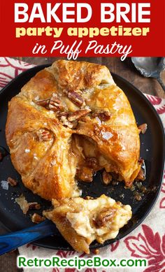 baked brie party appetizer in puff pastry on a black plate with text overlay