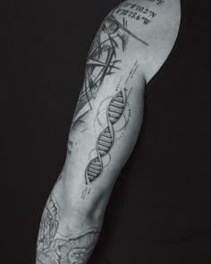 a man with a tattoo on his arm