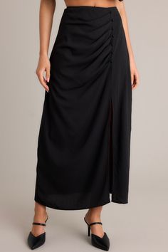 Looking for a skirt that's anything but ordinary? Then say hello to the Nocturne Niche Black Midi Skirt! With its unique design and eye-catching details, you'll stand out from the crowd while also feeling comfortable and confident. Perfect for a night out or a daytime adventure, this skirt is a must-have for any fashion-forward individual. This black midi skirt features a high waisted design, pleated detailing on the hip, faux buttons, a discrete side zipper, and a side slit. 100% Polyester Lined 100% Rayon Hand Wash Cold Manufactured in China Designed in the USA Model is wearing a size small Sorority Rush Dresses, Preppy Girls, Rush Dresses, Cardigan Crop Top, Concert Looks, Dress Bra, Friend Outfits, Black Midi Skirt, Black Midi