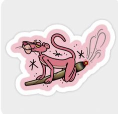 a pink sticker with an image of a cat sitting on top of a tree branch