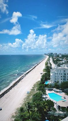 an aerial view of the beach and ocean