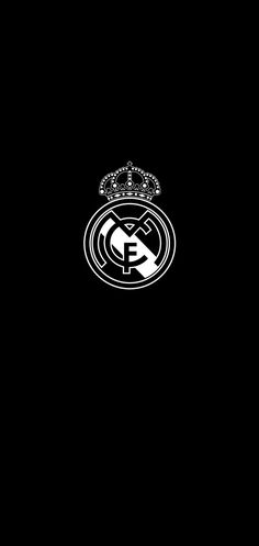 the real madrid logo on a black background