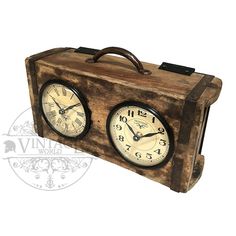 an old wooden box with two clocks on it's sides and the time is 11 00