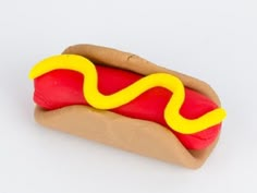 a hot dog with mustard and ketchup on it