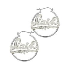 These fashionable nameplate hoop earrings are perfect for any occasion and everyday wear. You have up to ten characters to personalize your nameplate with the name of a loved one or your own. This sweetheart style features an eye-catching design of a smooth hoop earring and shimmering beaded rhodium nameplate that sparkles and wows. A glistening, winding underline with a heart in the center completes these earrings and makes them the perfect gift for a loved one. These nameplate hoop earrings ar Custom Name Silver Hoop Earrings For Anniversary, Custom Name Silver Hoop Earrings For Personalized Gift, Custom Name Silver Hoop Earrings As A Gift, Customizable Silver Hoop Earrings, Silver Hoop Earrings For Personalized Gift, Personalized Silver Hoop Earrings With Name, Personalized Silver Hoop Earrings, Personalized Hoop Earrings For Anniversary, Personalized Round Hoop Earrings For Anniversary