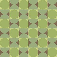 a green and brown wallpaper with circles