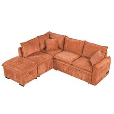 a brown sectional couch with pillows on it