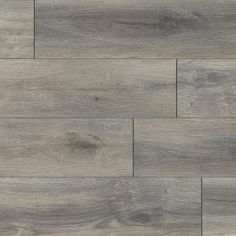 an image of wood flooring that looks like it has been painted in grey tones