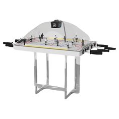 an ice hockey table with two goalies on it