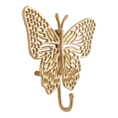 a gold butterfly shaped hook on a white background